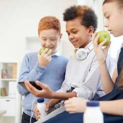 school-children-using-phone-at-school.jpg school-children-using-phone-at-school.jpg